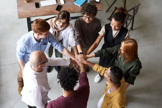 people shaking hands in a meeting