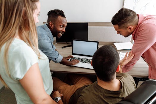 image of a team collaborating in a tech-driven environment