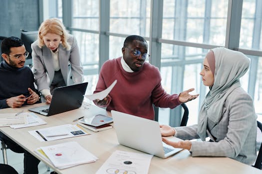 consultants collaborating at a meeting